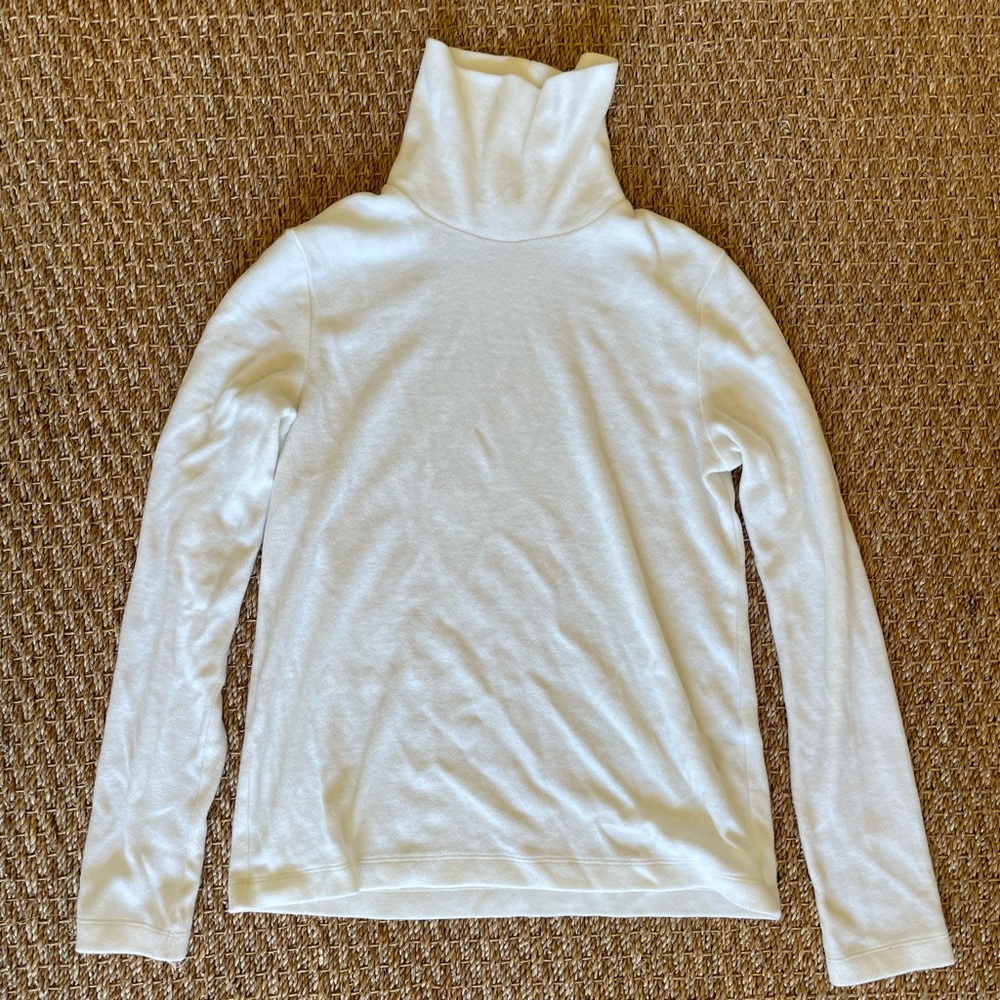 Uniqlo small fleece turtleneck. Never worn.